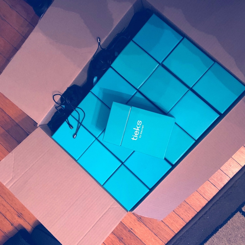Empty Tieks boxes.
